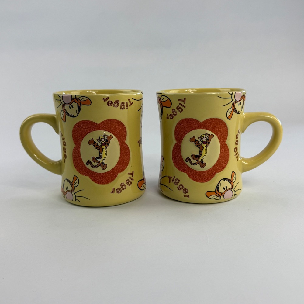 Disney Theme Parks Tigger Yellow Ceramic Coffee Mug Set of 2 Textured Flower‎